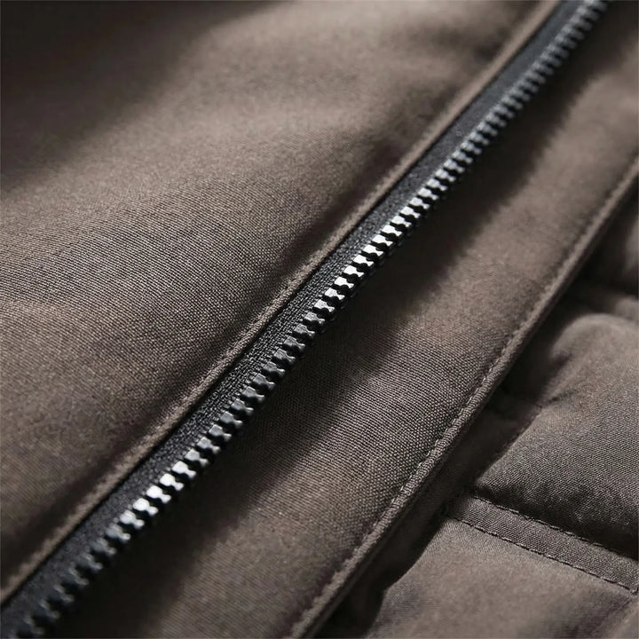 Comfortable hooded thermal jacket, designed for unisex fit & maximum warmth in chilly outdoor conditions.
