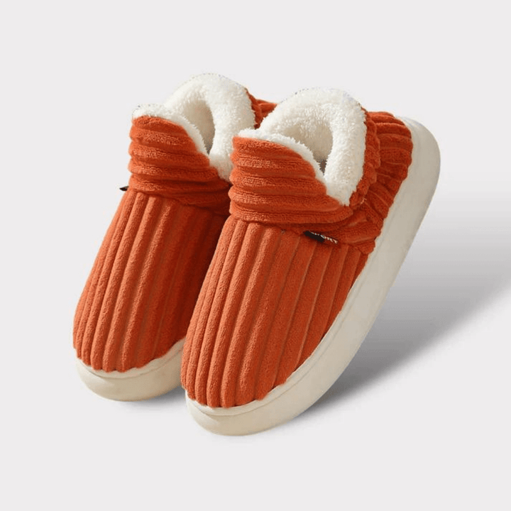 Warm unisex thermal slippers for superior winter comfort at home.