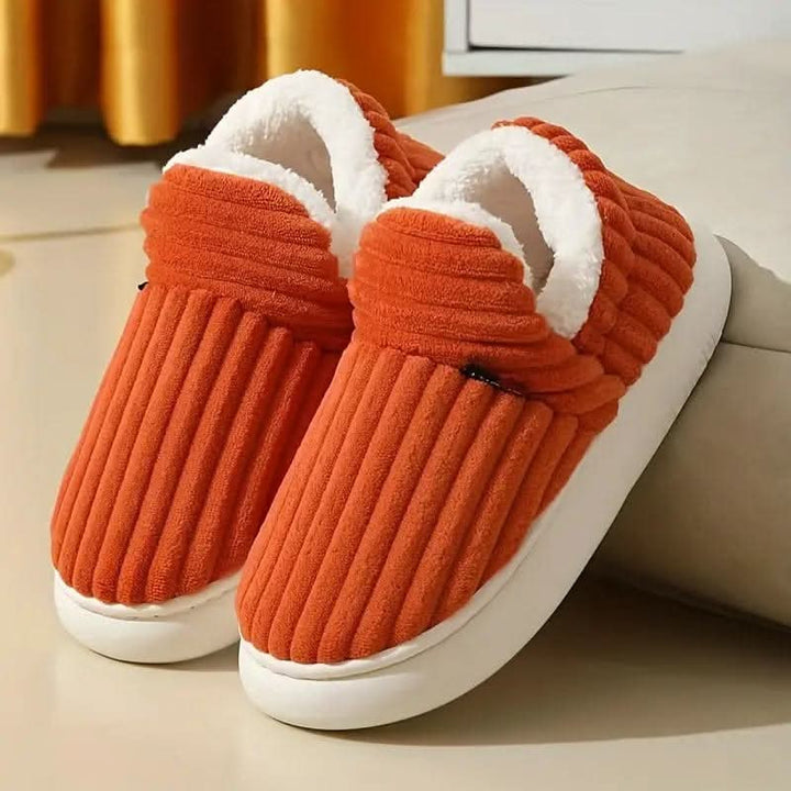 Keep feet warm with these cozy unisex thermal house slippers; ultimate winter comfort.