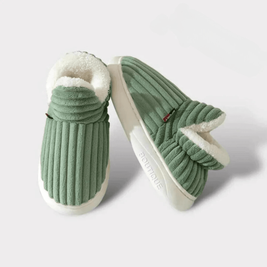 Pair of warm unisex thermal house slippers, ready for cozy winter comfort.