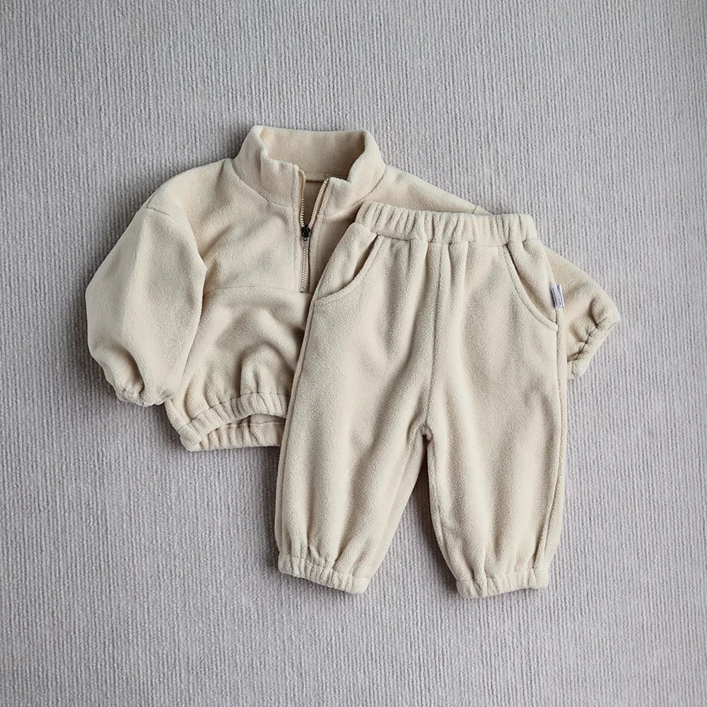 Detail of the fleece material on a toddler hoodie, soft and warm for babies