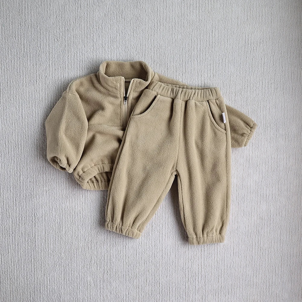 Fleece-lined pants for toddlers, gray, part of a cozy infant apparel set