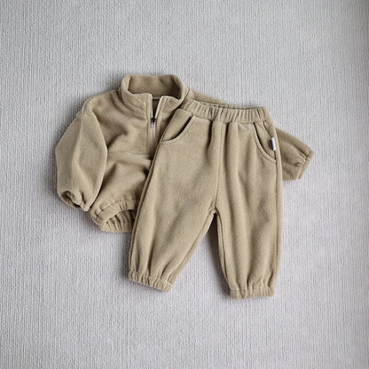 Fleece-lined pants for toddlers, gray, part of a cozy infant apparel set