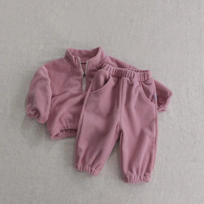 Full shot of a unisex toddler fleece track suit, comfortable baby sports outfit
