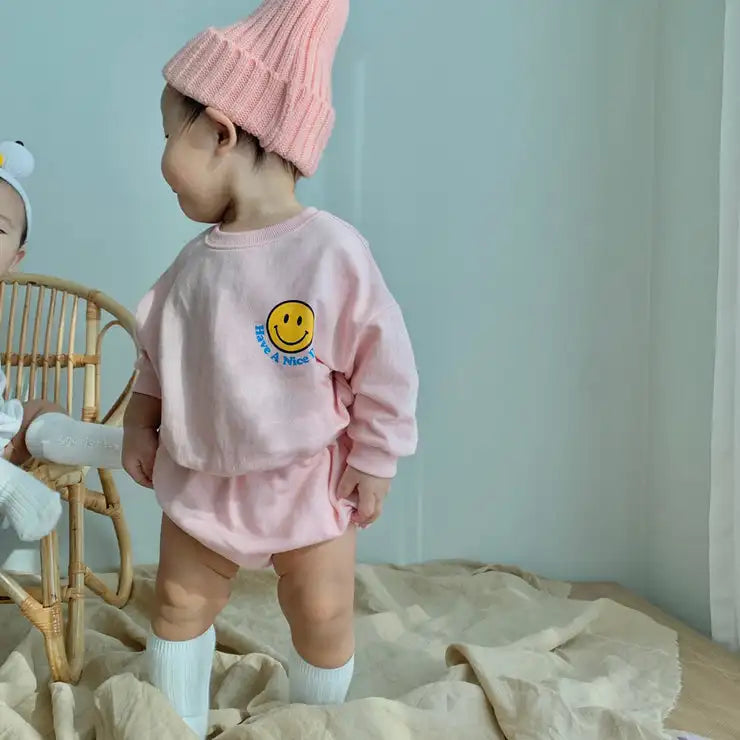 Toddler unisex cotton set with bright smiley face sweatshirt and breathable short pants