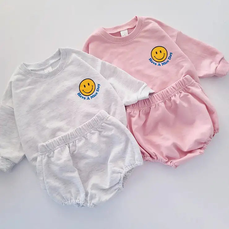 Toddler cotton long-sleeve sweatshirt with yellow smiley face graphic and matching shorts