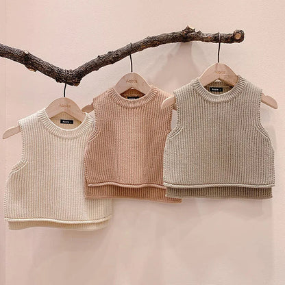 Warm knit vest for toddlers, providing comfort and style as baby outerwear.