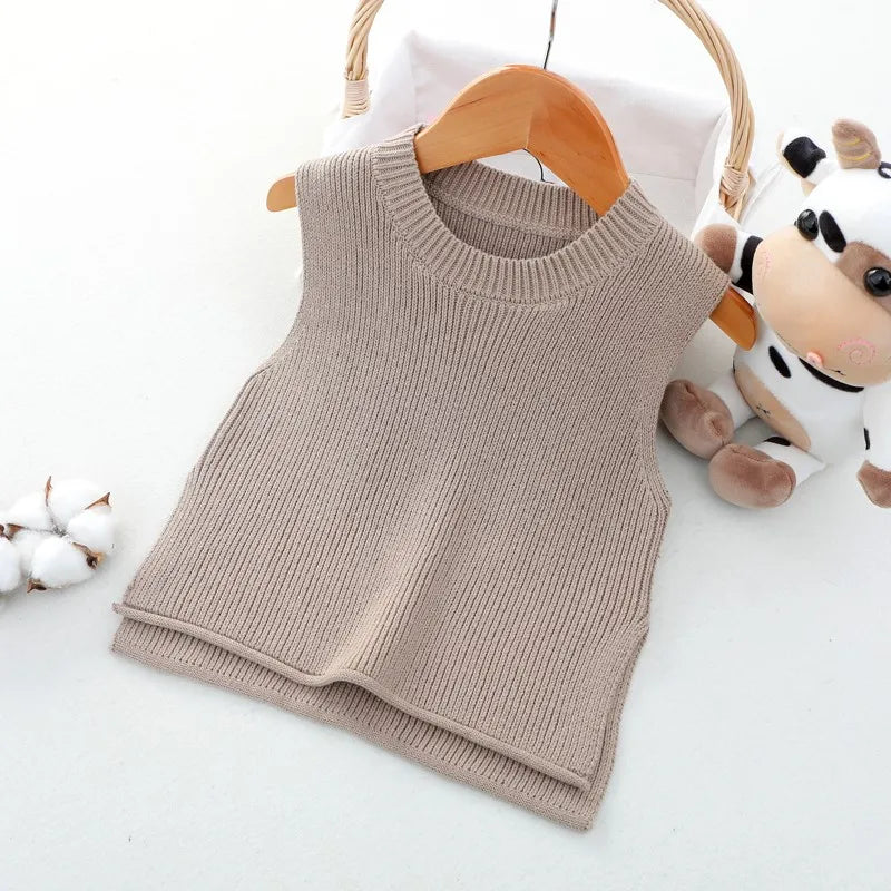 Soft knit toddler vest, offering warmth without bulk, essential for autumn fashion.