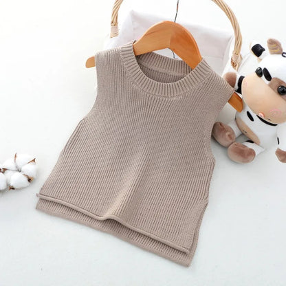 Soft knit toddler vest, offering warmth without bulk, essential for autumn fashion.