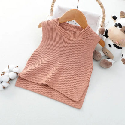 Baby knit vest, a simple yet effective layering piece, perfect for autumn outerwear.