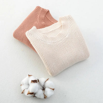 Unisex baby knit vest, a solid color staple for any toddler's autumn wardrobe.