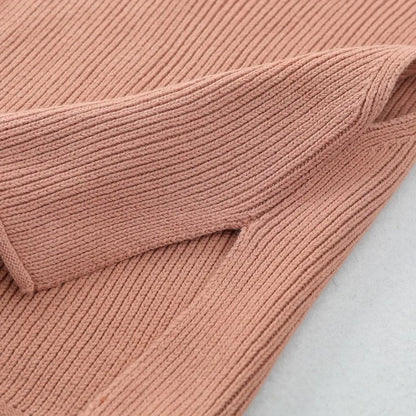 Solid knit cotton vest for toddlers, an essential for fall layering and baby outerwear.