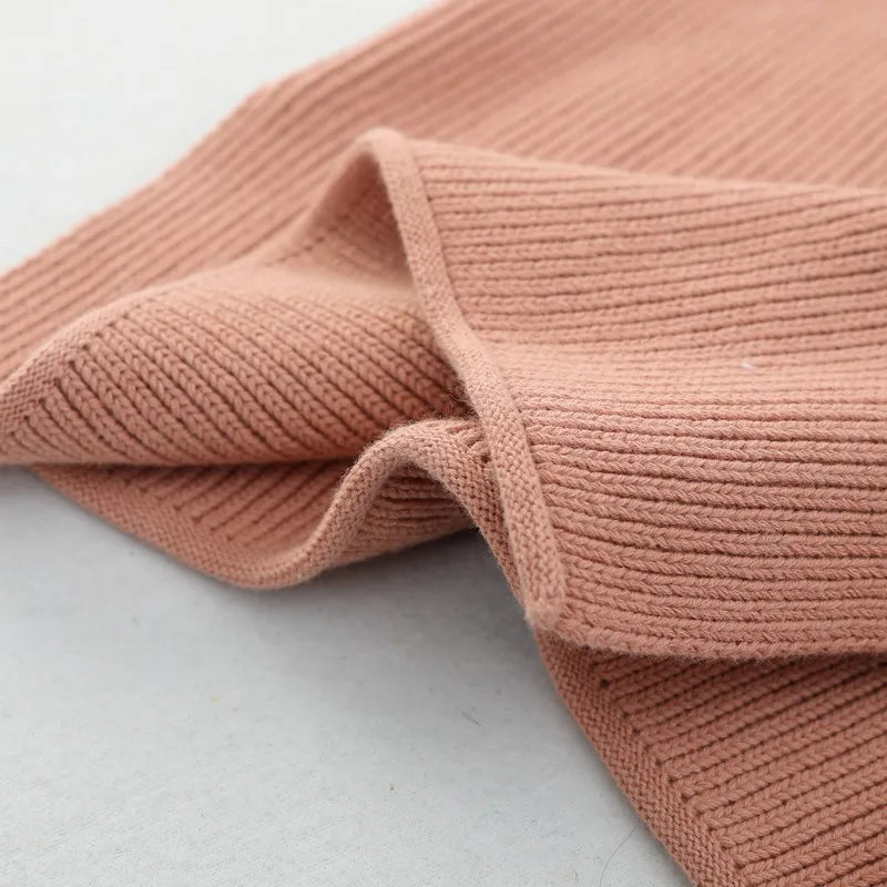 Cute knit toddler vest, a practical and stylish unisex piece for autumn kids clothing.