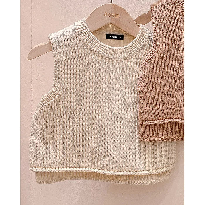 Unisex baby knit vest in a solid color, great for warmth and style in autumn.