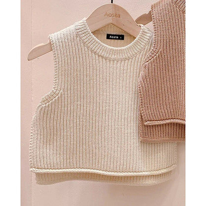 Unisex baby knit vest in a solid color, great for warmth and style in autumn.