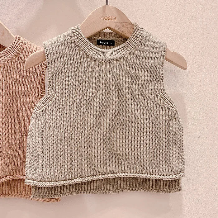 Cotton knit vest for toddlers, a soft outerwear option for casual fall days.