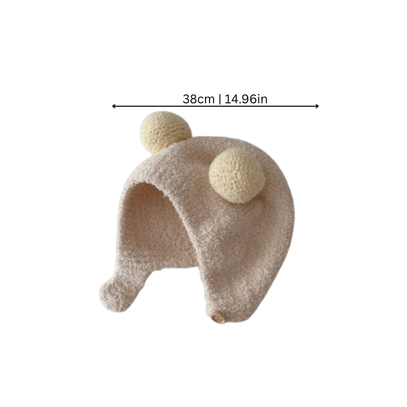 Warm winter fleece hat for toddlers, featuring earflaps and a cozy pom, ideal for kids.