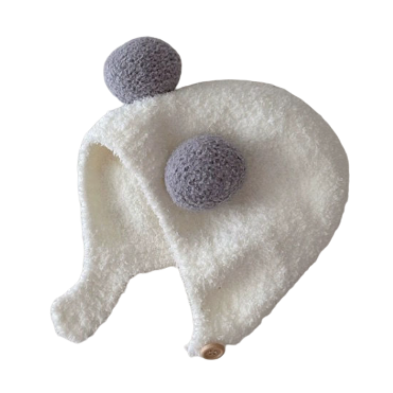 Unisex toddler winter hat, thick fleece with earflaps and pom, ensuring baby stays warm.