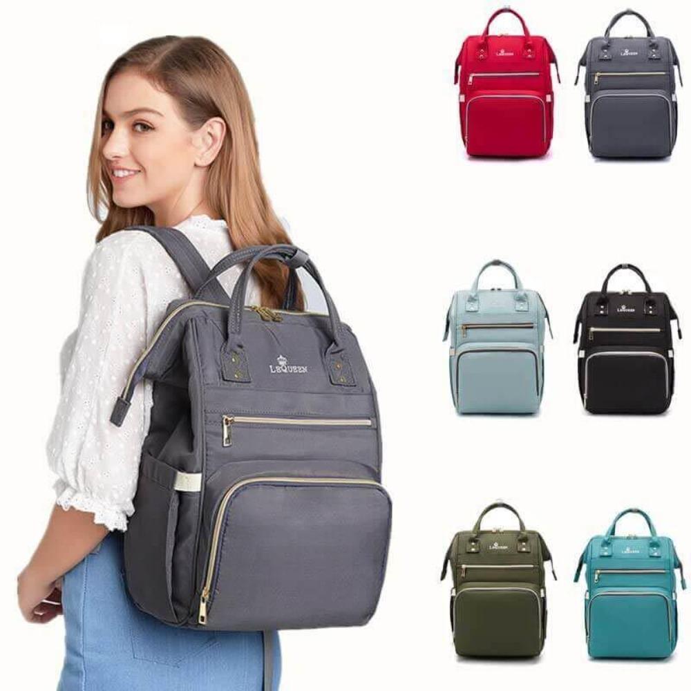 Unisex travel diaper backpack with insulated pockets for bottles & organization. Perfect parenting essential.