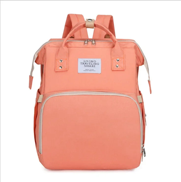 Must-have unisex travel diaper bag, featuring a detachable changing station and crib.