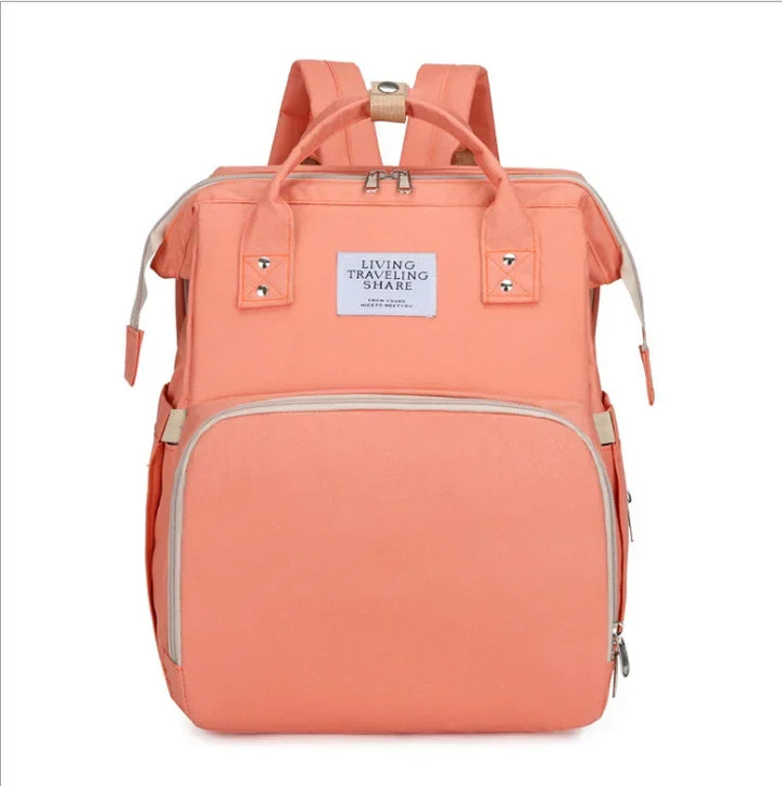 Must-have unisex travel diaper bag, featuring a detachable changing station and crib.