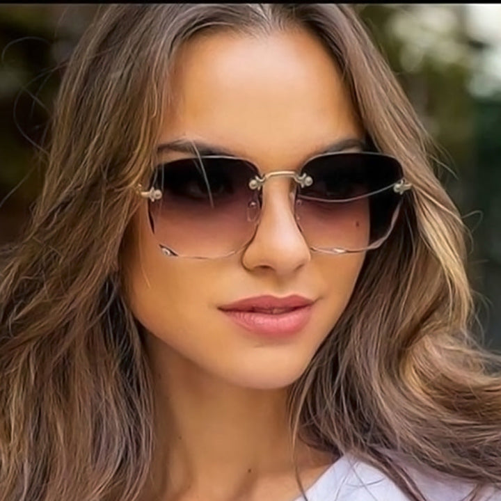 Unisex trendy rimless sunglasses with UV400 protection, perfect for summer eye protection.
