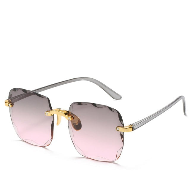 Vintage-inspired rimless sunglasses for unisex fashion, featuring square lenses and UV400 protection.