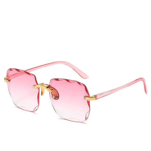 Trendy unisex rimless sunglasses with UV400 protection, a must-have vintage-style fashion accessory.