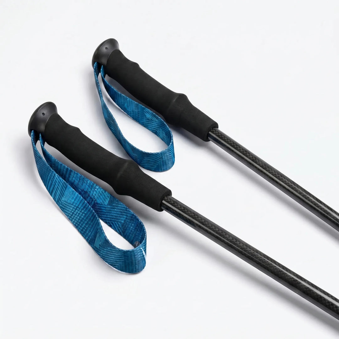 Compact, collapsible carbon fiber hiking poles, perfect for easy packing in your backpacking gear.