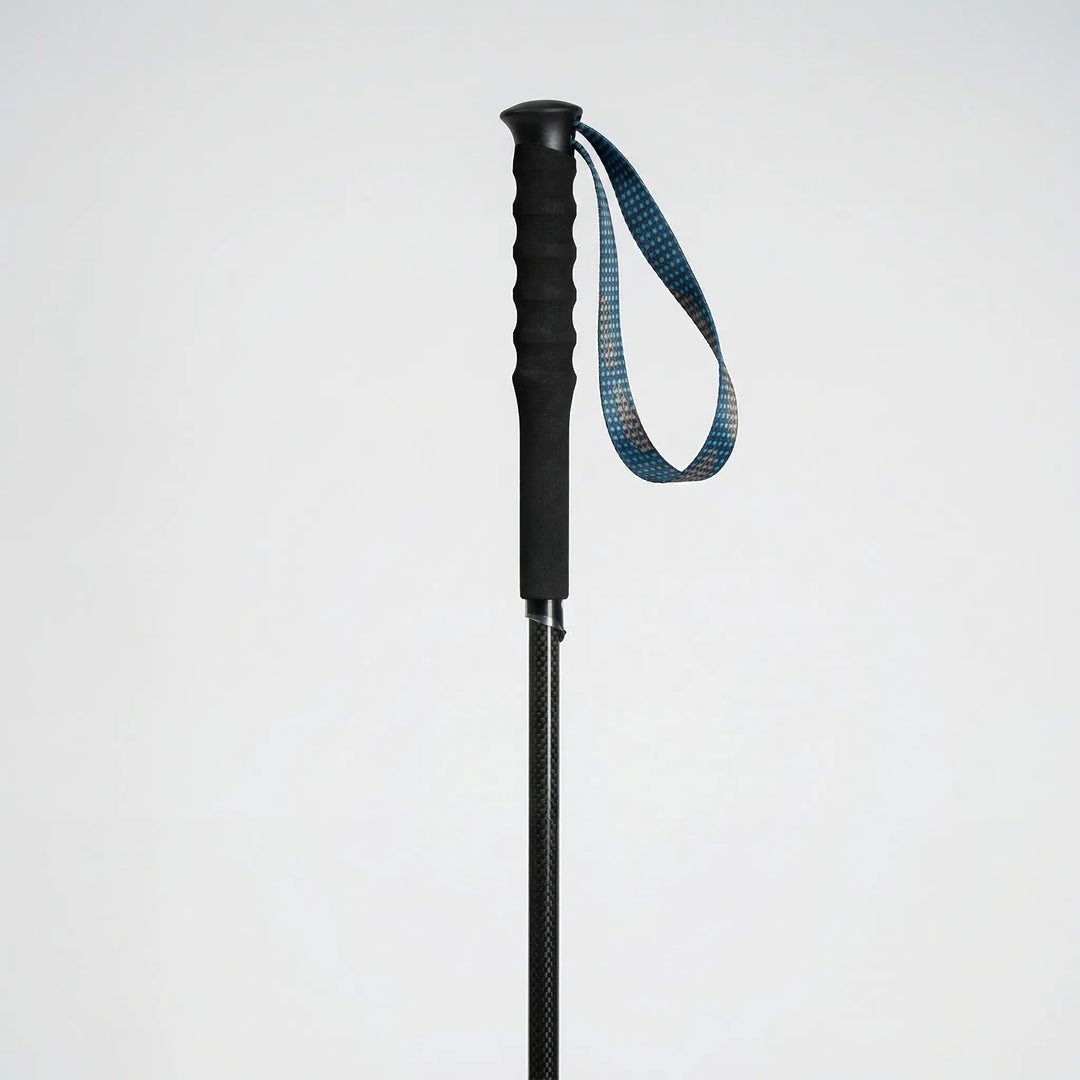 Lightweight carbon fiber trekking poles, ultralight and strong, ideal outdoor gear for any hiking trail.