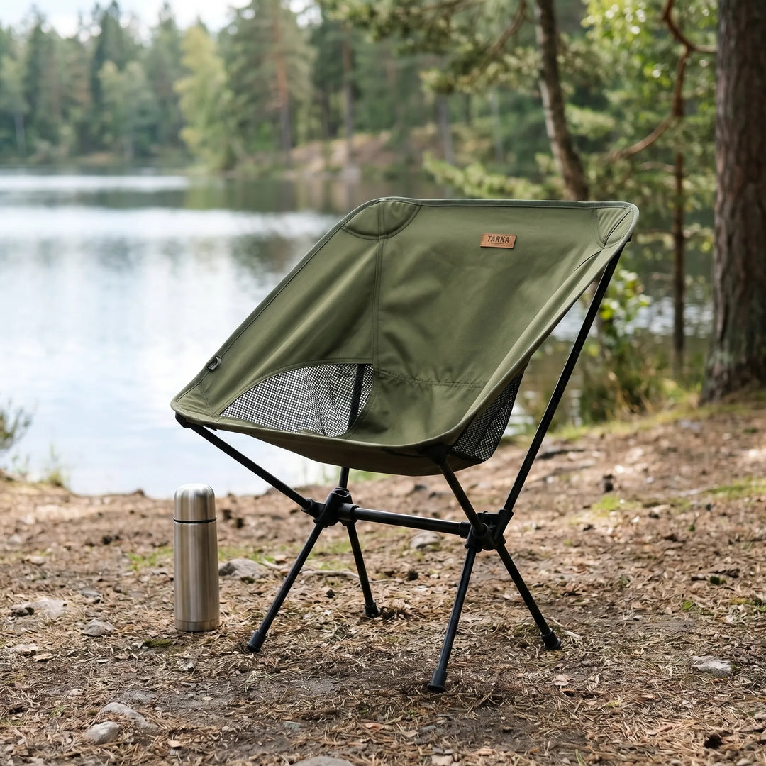 Unisex ultralight folding camping chair with aluminum frame & breathable mesh seat for outdoor adventures.