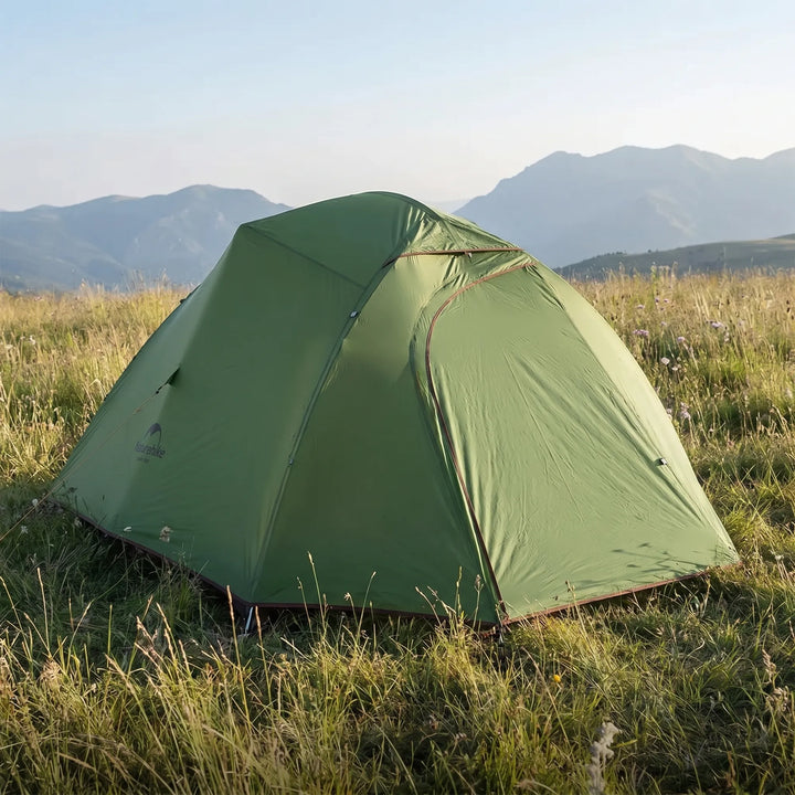 Unisex ultralight freestanding tent pitched in a scenic mountain landscape. Perfect for 3-season backpacking.