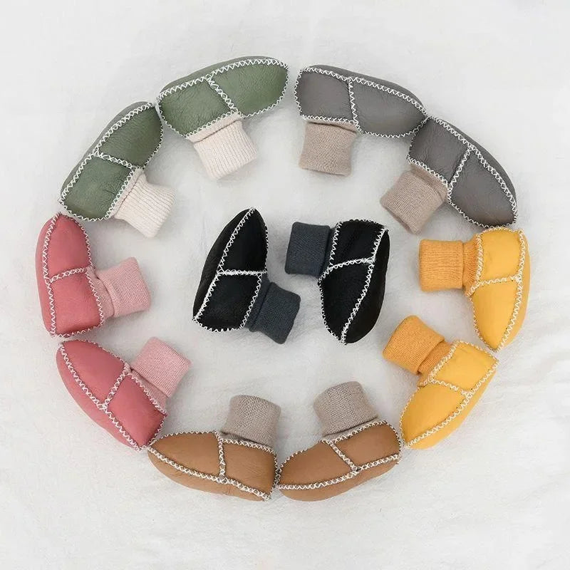 Detail of anti-slip sole on warm baby slipper, ensuring safe cotton blend toddler shoes