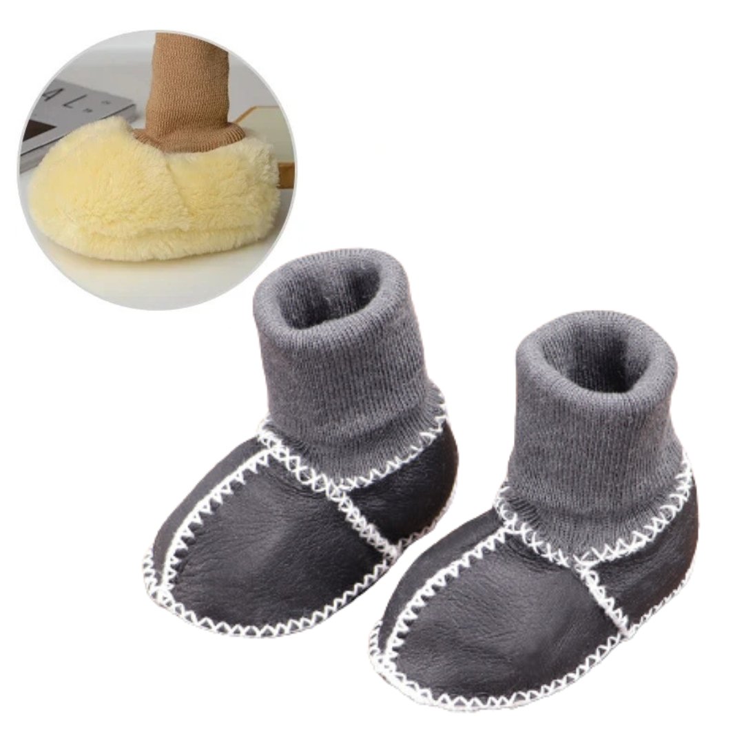 Top view of warm anti-slip baby slippers, cozy and practical toddler footwear choice