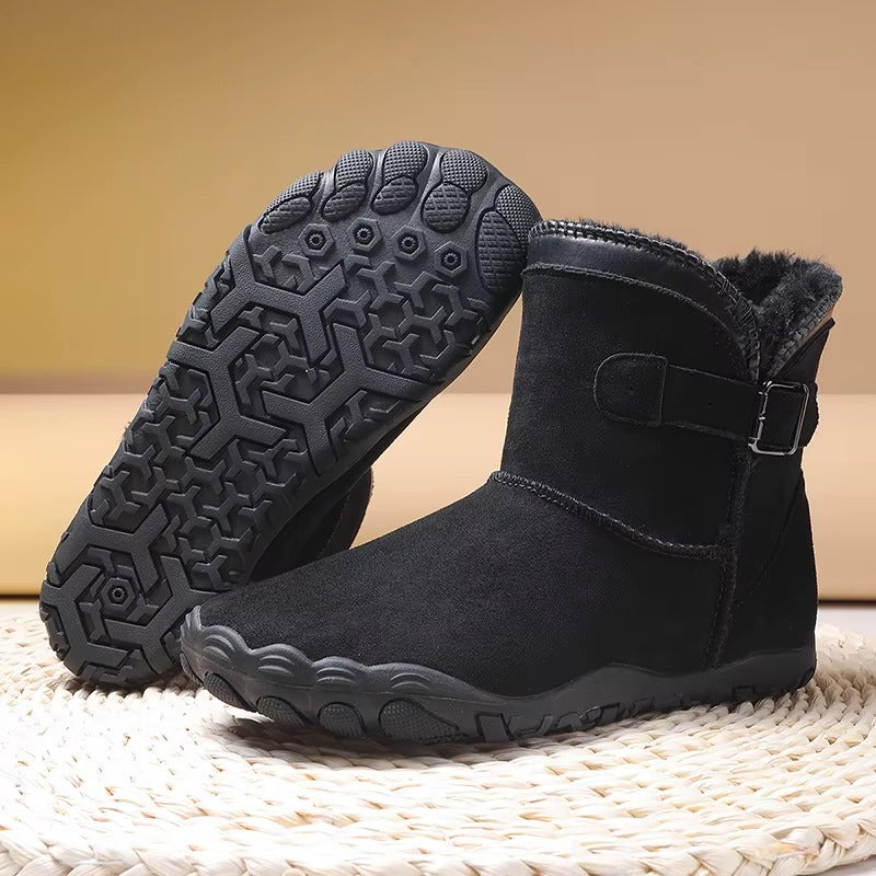 Minimalist unisex warm boots designed for natural foot function and cold protection.