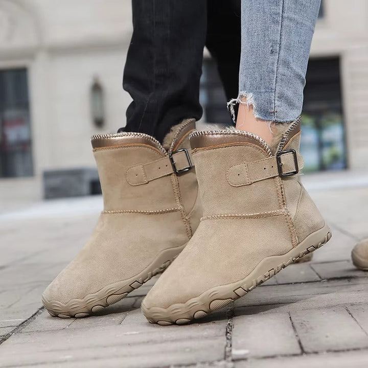 Outdoor-ready barefoot winter boots offering warmth and natural movement.