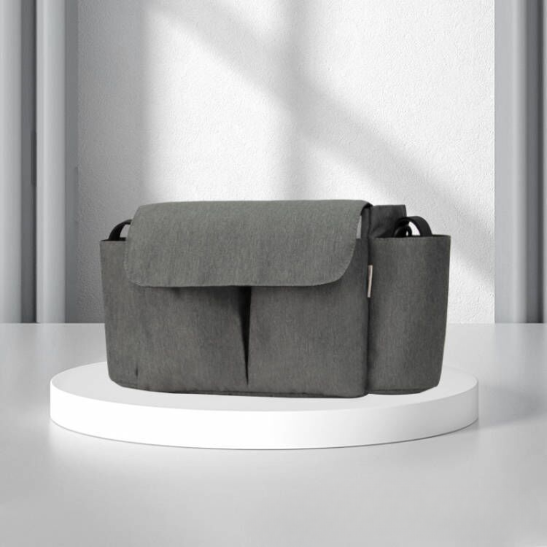 Durable stroller organizer for baby travel, featuring secure attachment straps.
