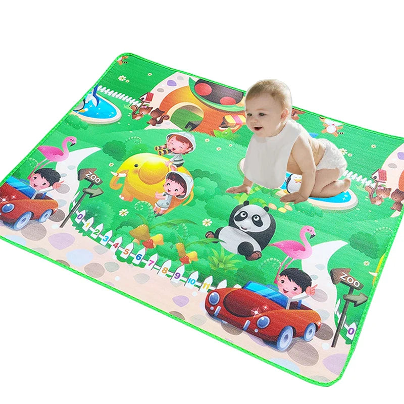 Portable waterproof baby play mat, featuring a playful design, ideal for toddler outdoor activity.