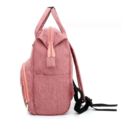 Large capacity nappy bag in blue, waterproof design for parents, featuring multiple compartments, baby travel.