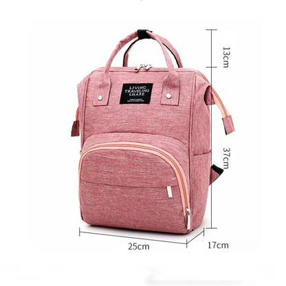Unisex diaper backpack in green with insulated bottle pockets, waterproof and essential for parenting.