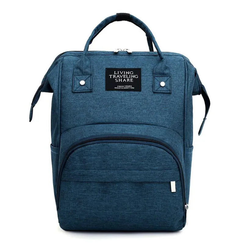 Elegant gray diaper backpack, unisex and waterproof, spacious interior for all baby travel needs.