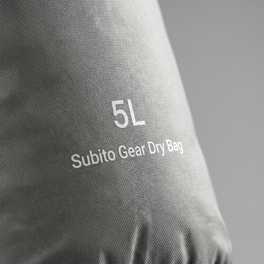Roll-top dry sack keeps travel essentials safe and dry, ideal for any journey.