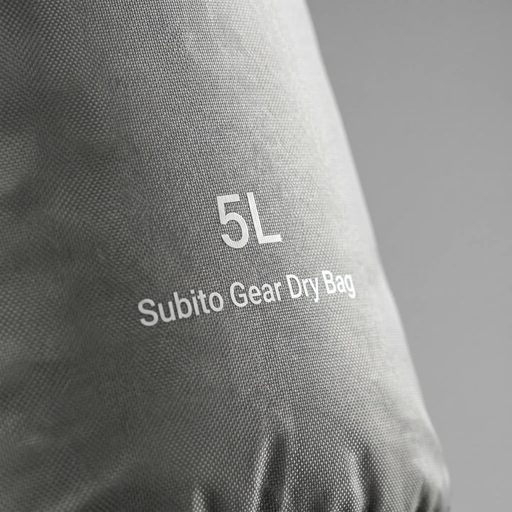 Roll-top dry sack keeps travel essentials safe and dry, ideal for any journey.