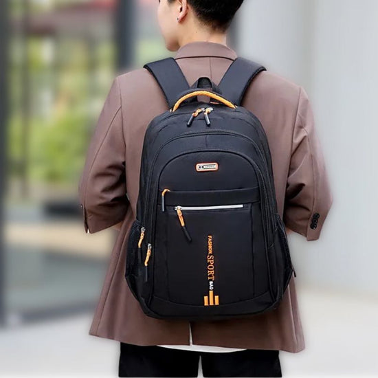 Unisex waterproof travel backpack for organized day trips & commutes. Durable, multi-compartment design.