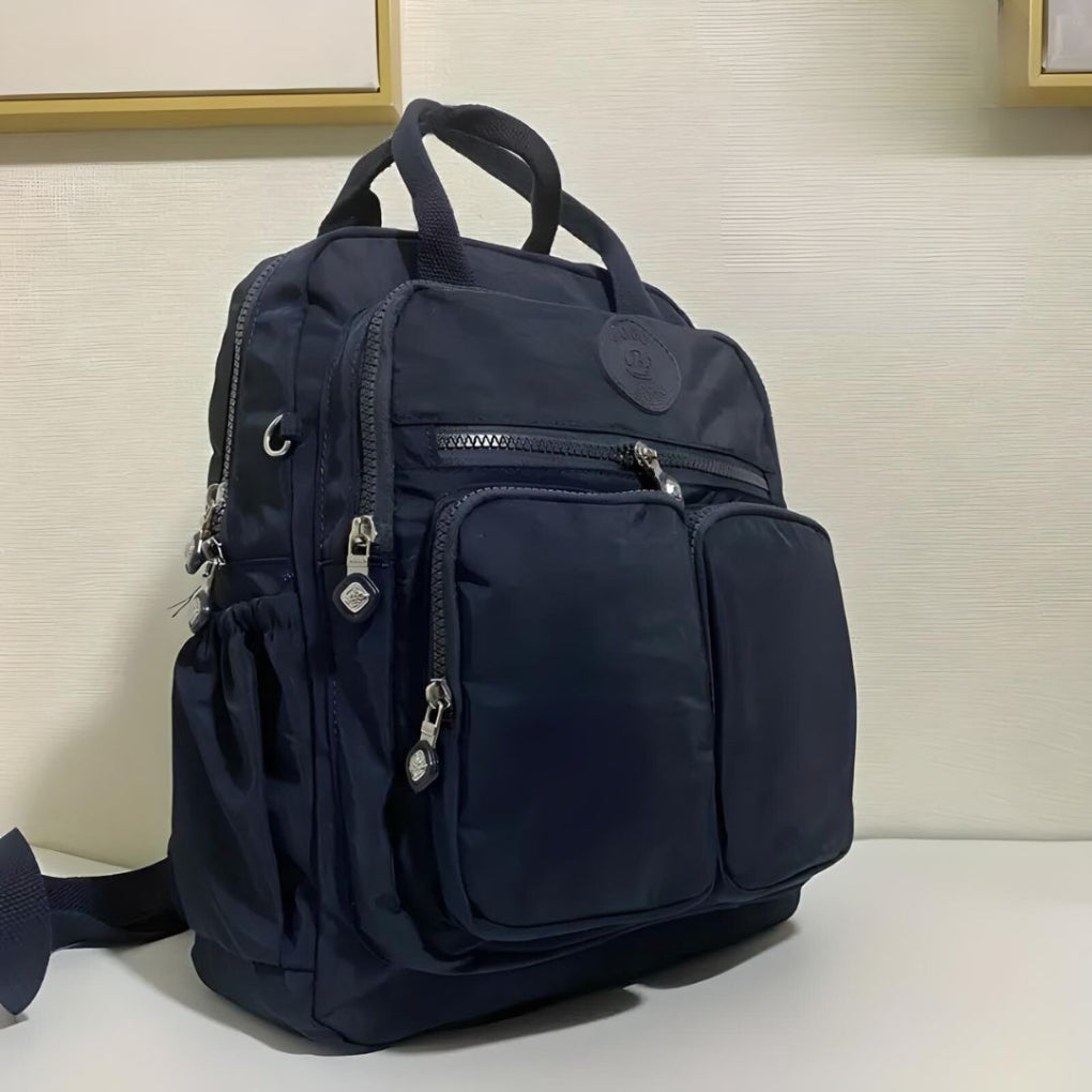 Spacious waterproof city backpack, a multi-pocket design ideal for daily essentials & travel.