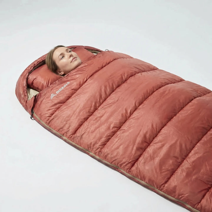 Comfortable oversized 3-season adult sleeping bag, ideal for camping, ensuring a restful night in the outdoors.