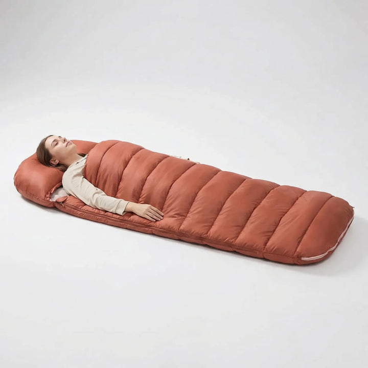 Spacious unisex sleeping bag for 3-season camping, providing ample room for adults during hiking adventures.