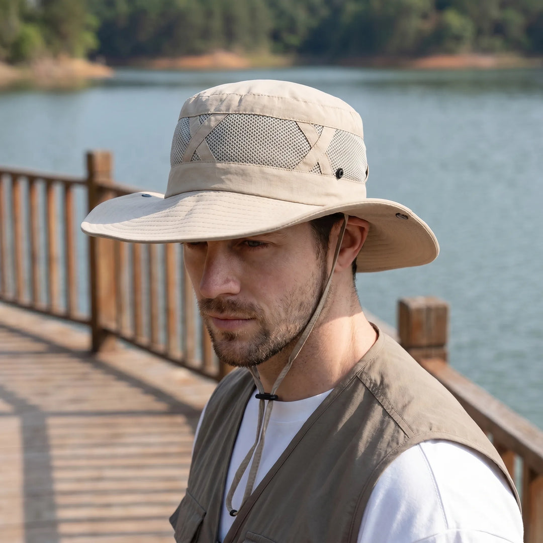 Unisex wide brim fishing sun hat with UV protection & ventilated mesh. Ideal for outdoor activities like hiking.