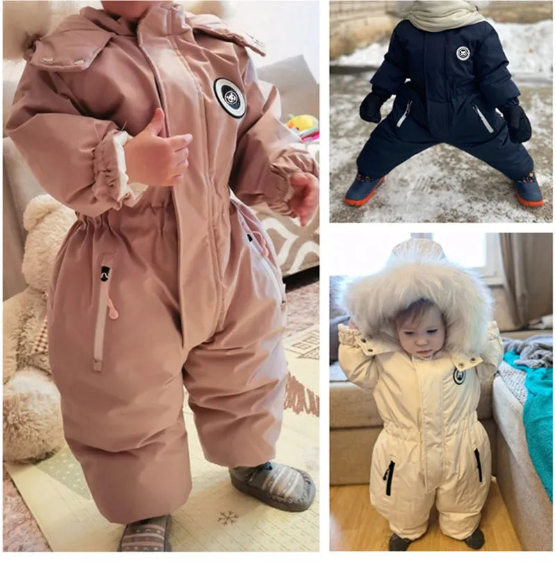 Toddler in a comfortable unisex ski suit, warm snowsuit for winter play, hooded