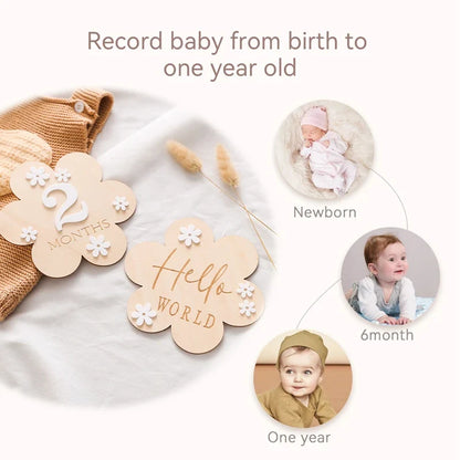 Close-up of a 'three months' wooden baby milestone card, unisex baby accessory